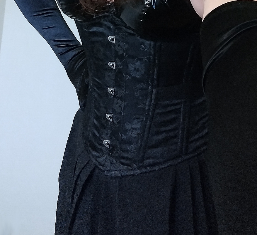 A black underbust brocade corset